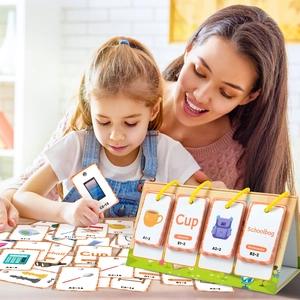 Close-up of mother and child using English flashcards on a yellow desktop stand