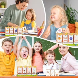 Close-up of educational flip cards for children featuring english words and illustrations