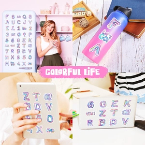 Waterproof metallic laser alphabet and number stickers shown on laptop and water bottle