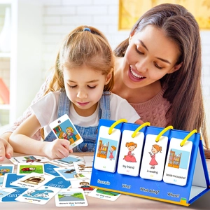 A mother and child using a blue desktop flip chart for English sentence building and learning