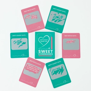 Sweet Commands interactive couple card game set with scratch-off fun in pink and green