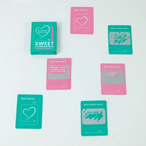 Macro view of 46 pink and green couple interactive scratch-off game cards with 18+ tasks