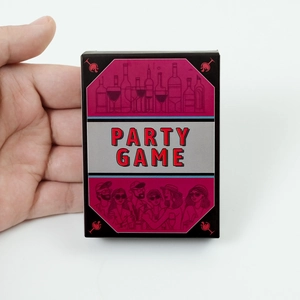 Close-up of portable Party Game box packaging with social scene illustrations