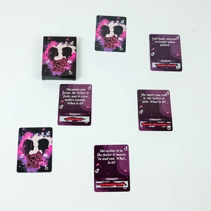 Couples mystery scratch-off game cards set with English riddles and black gift box