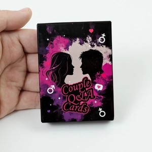 Close-up of Couple Q&A Cards compact packaging showing romantic silhouette design
