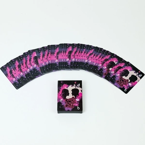 Fan-shaped display of Couple Q&A Cards with pink nebula design and black packaging box