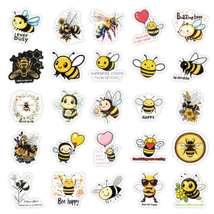 Close-up of 25 unique yellow cartoon bee stickers with waterproof white borders
