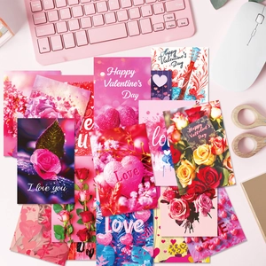50-piece pink Valentine's Day decorative cards with hearts and roses flat lay on desk