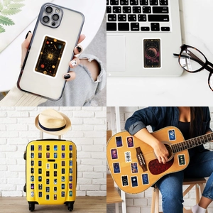 Cosmos star theme stickers applied on a laptop, guitar, phone case and yellow luggage case