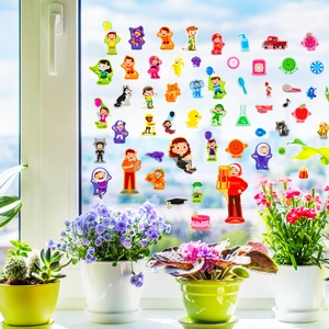 Kids color recognition sticker book with vibrant cartoon animals on window glass