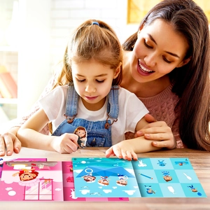 Close-up of mother and daughter playing with colorful educational sticker book scenes