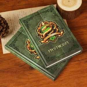 Carnet vintage vert d'académie de magie avec fermeture magnétique et emblème doré