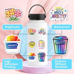 Detail showing waterproof anxiety relief stickers on a white water bottle with HD print