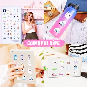 Ghost stickers applied to laptops and water bottles for creative decoration