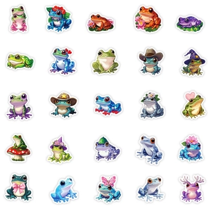 Vue à plat de 25 autocollants de grenouilles mignons avec bordures blanches sur fond blanc