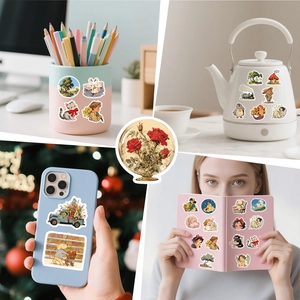 Pastel vintage cottagecore stickers applied on laptops, notebooks and kitchen appliances
