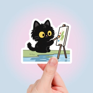 Détail d'un autocollant chat noir mignon pour la décoration de journaux et papeterie