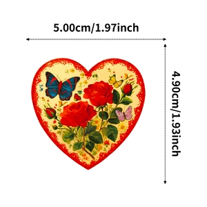 Close-up of vintage heart sticker featuring red roses and butterflies with measurements