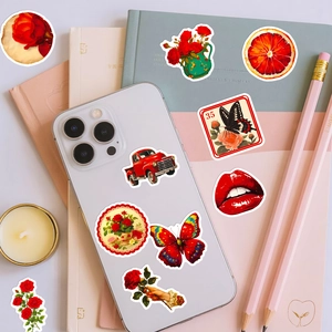 Detail of vintage rose and butterfly stickers applied on a smartphone back cover