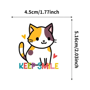 Close-up of a cute spotted cat sticker with Keep Smile text and precise 5.16cm dimensions