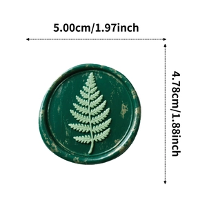Detail showing dimensions of dark green fern wax seal sticker with gold antique finish
