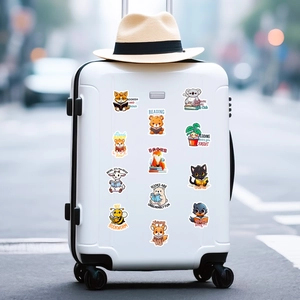 Detail of cute animal reading stickers with motivational quotes on a white suitcase