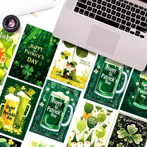 St. Patrick's Day green clover greeting cards collection on office desk with camera