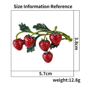 Size chart for strawberry brooch measuring 5.7cm by 3.8cm with weight information