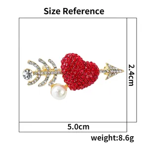 Fashion alloy heart and arrow brooch with red rhinestones and white pearl detail