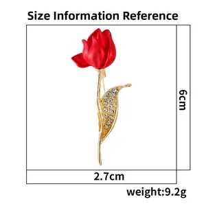 Detail of red tulip brooch with gold leaves and rhinestones, size 6cm by 2.7cm