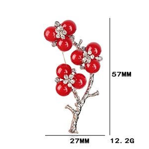 Spécifications de taille pour la broche fleur rouge avec hauteur 57mm et largeur 27mm