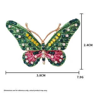 Spilla a farfalla vintage con smalto verde e cristalli, base dorata larghezza 3.8cm
