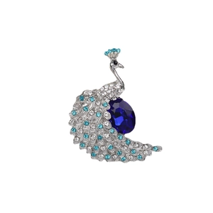 Spilla pavone scintillante con cristalli blu e strass su montatura argentata