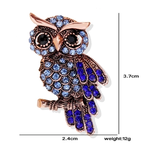 Elegant owl brooch with blue crystals and vintage copper base, size 3.7cm by 2.4cm