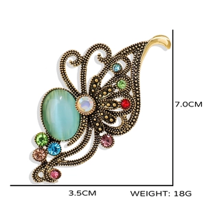 Vintage aurora purple butterfly brooch with colorful rhinestones in golden finish