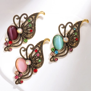 Vintage aurora purple butterfly brooches with multi-color rhinestones and cat-eye gems