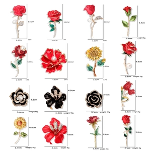 Collection of 16 elegant floral pearl brooches in assorted rose and sunflower designs