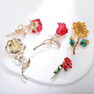 Exquisite flower brooch set with red roses and sunflower in gold alloy with pearls
