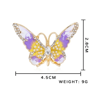 Élégante broche papillon en alliage doré avec émail perles et strass brillants
