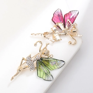 Detailed view of ballet fairy brooches with sparkling crystals and gradient enamel wings