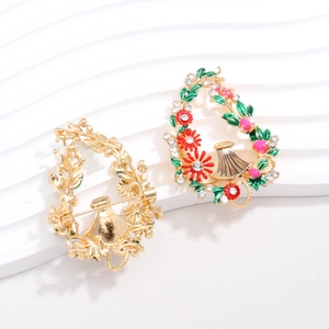 Elegant vintage flower basket brooch with colorful enamel and sparkling rhinestones