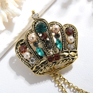 Vintage gold crown brooch with colorful rhinestones, pearls and hanging chain tassels