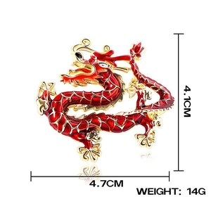 Detailed view showing the 4.7cm x 4.1cm dimensions of the red enamel dragon brooch