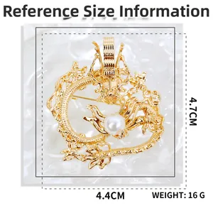 Detailed size information for the golden dragon brooch with dimensions 4.4cm by 4.7cm