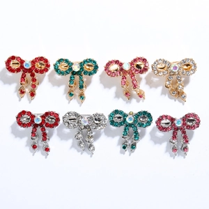 Vintage style bow brooch pins with rhinestones and tassels in eight colorful variants