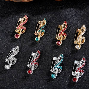 Broches vintage notes de musique élégantes avec strass colorés en finitions or et argent