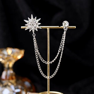 Zilveren vintage sterbroche met witte strass steentjes en dubbele kwastkettingen