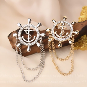 Vintage nautical helm and anchor brooch set with rhinestones and hanging double chains
