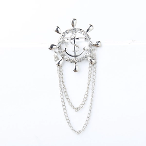 Silver nautical helm and anchor brooch with white rhinestones and double fringe chains