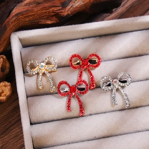 Elegant butterfly brooches with rhinestones and crystals in gold, silver, and red colors